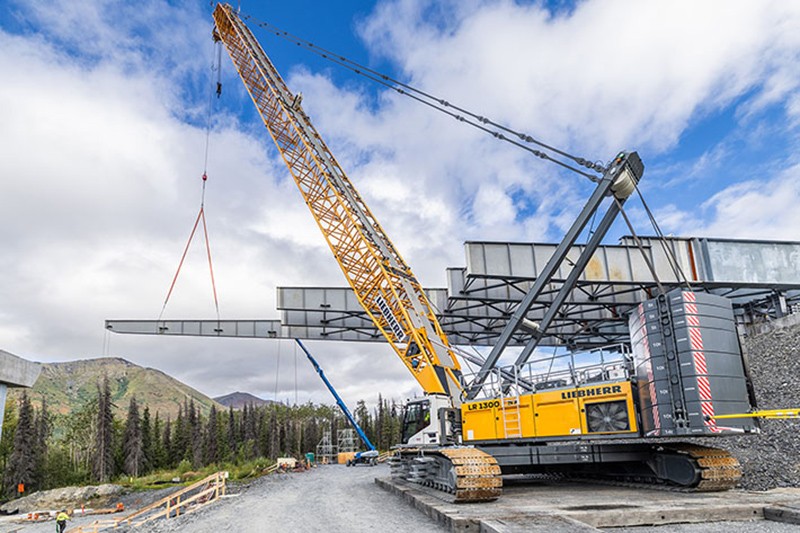 Two Liebherr Crawler Cranes close a gap: Juneau Creek Bridge in Alaska