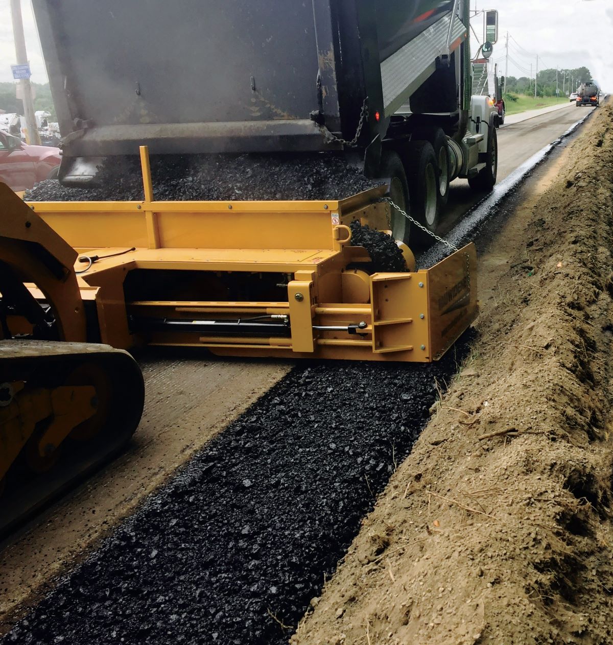 Road Widener Increases Versatility of Offset Vibratory Roller Attachment with New Accessory