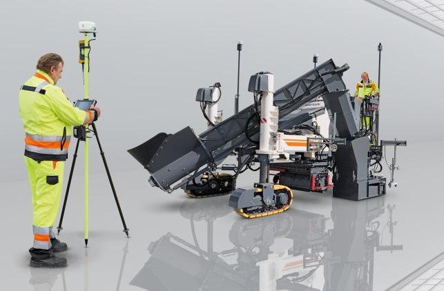 String line-free in Mobile. Producing kerbs as if by magic: in Mobile Bay on the Gulf of Mexico in the US state of Alabama, a Wirtgen slipform paver SP 15i operated fully automatically